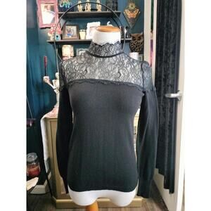 Jenifer Lopez black long sleeve lace blouse